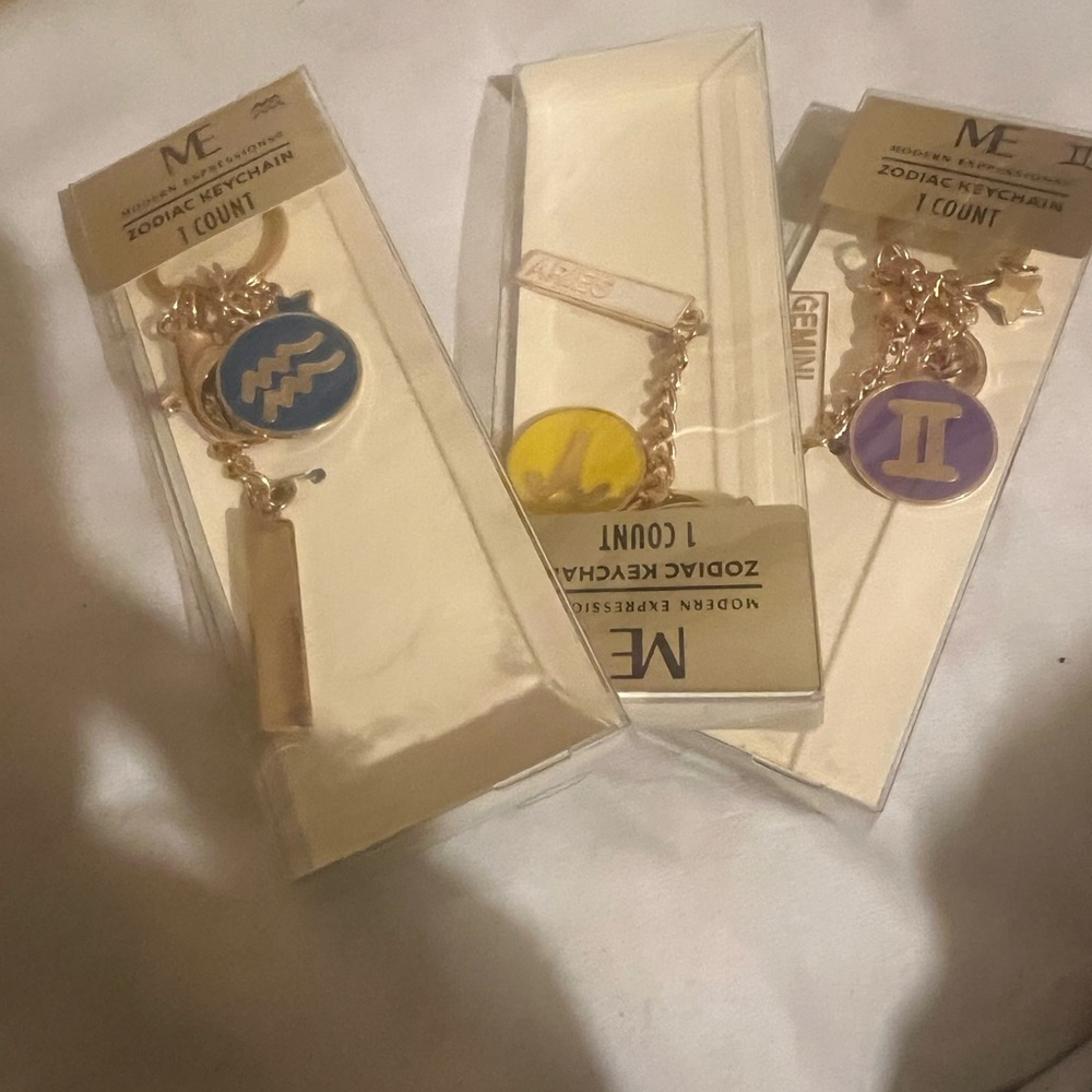 ZODIAC KEYCHAINS MODERN EXPRESSIONS ARIES,AQUARIUS, GEMINI NIB